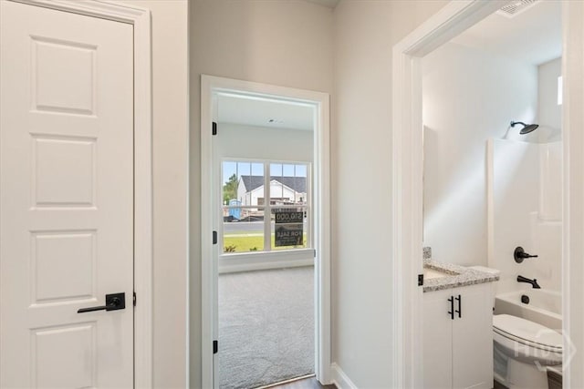 287 Timberlake Dr, Guyton, GA 31312 - full bath featuring vanity, toilet, bathing tub / shower combination, and baseboards
