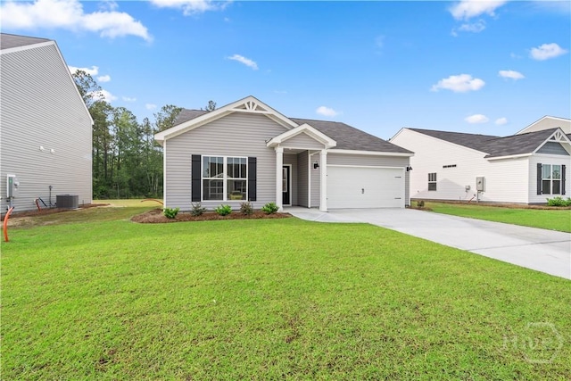 287 Timberlake Dr, Guyton, GA 31312 - view of front of house with central AC, an attached garage, driveway, and a front lawn