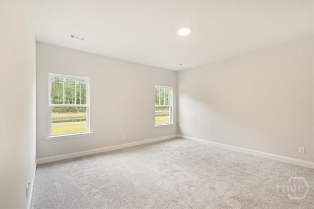 287 Timberlake Dr, Guyton, GA 31312 - empty room with carpet flooring, plenty of natural light, and baseboards