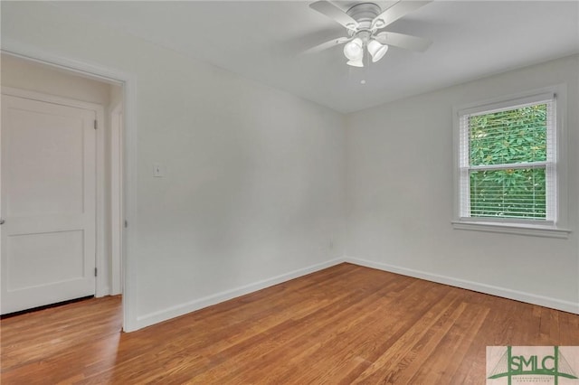 unfurnished room with light hardwood / wood-style flooring and ceiling fan