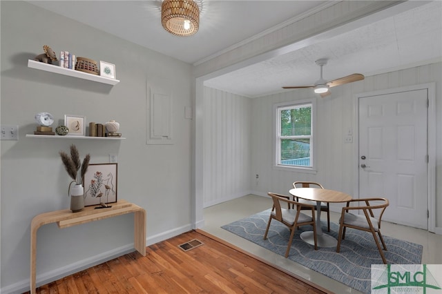 dining area featuring hardwood / wood-style flooring and ceiling fan