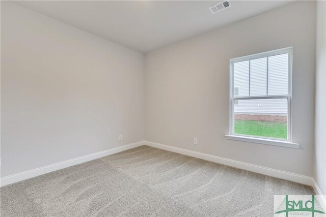 view of carpeted spare room