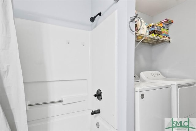 clothes washing area with separate washer and dryer