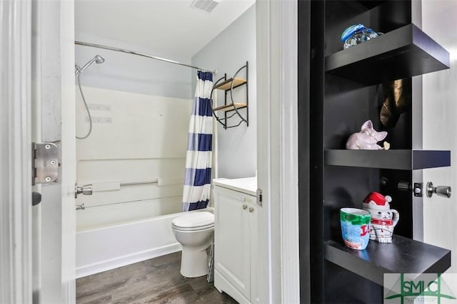 full bathroom with vanity, shower / bathtub combination with curtain, wood-type flooring, and toilet