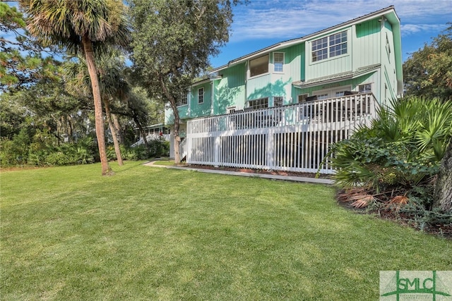 view of yard featuring a deck