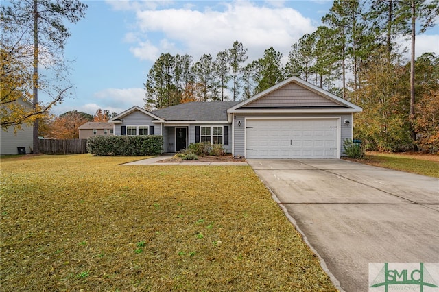 ranch-style house featuring a garage and a front lawn