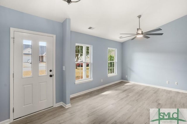 entryway with ceiling fan and light wood-type flooring