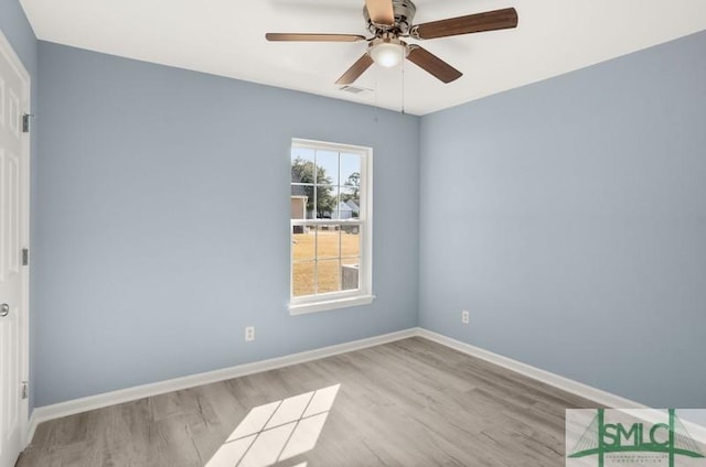 spare room with ceiling fan and light hardwood / wood-style floors