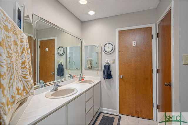 bathroom featuring vanity and tile patterned floors