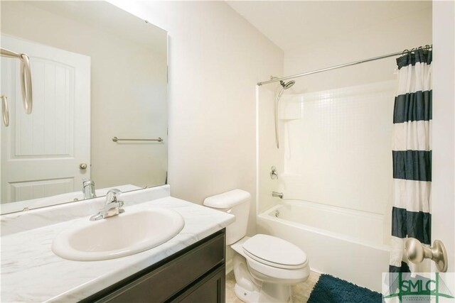 full bathroom with vanity, toilet, and shower / bath combo with shower curtain