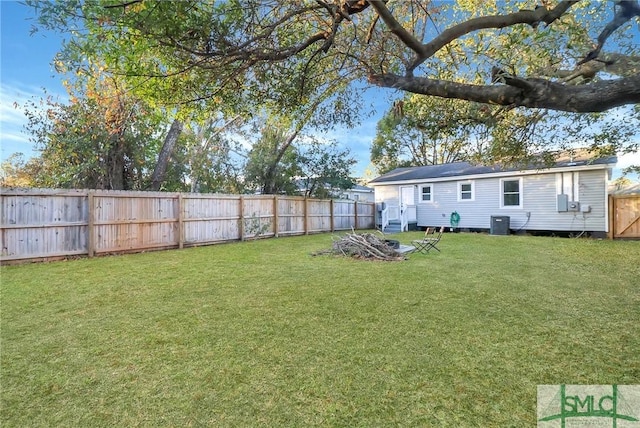 view of yard with central AC