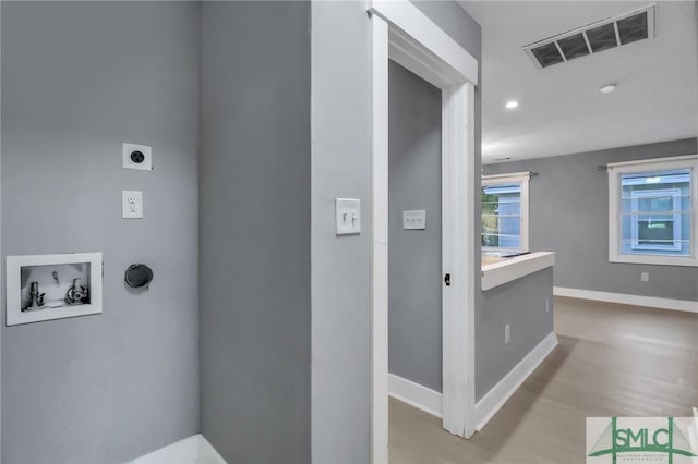 hallway featuring light hardwood / wood-style floors