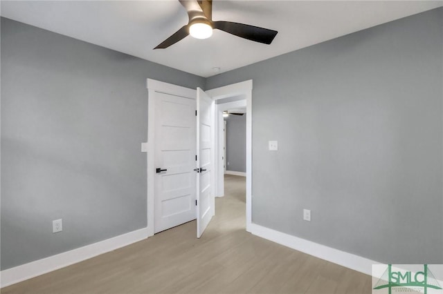 unfurnished bedroom with light hardwood / wood-style flooring and ceiling fan