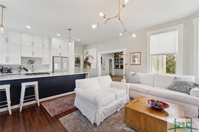 living room with dark wood-type flooring