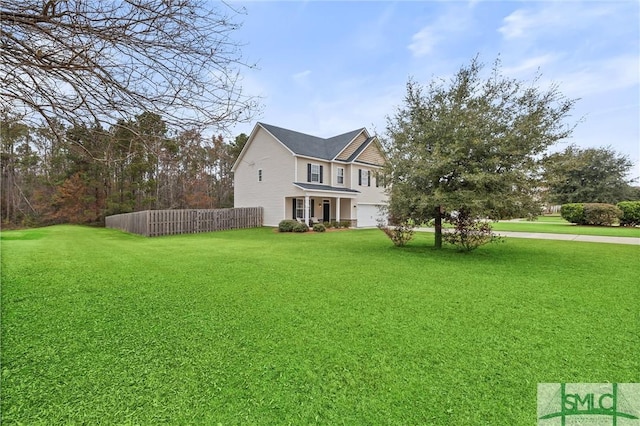 view of yard featuring a garage