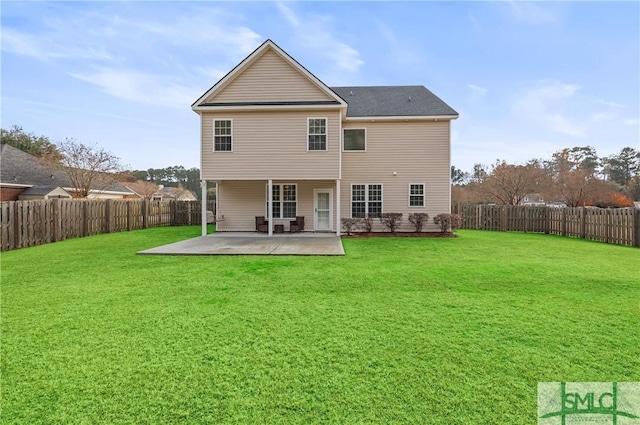 rear view of property featuring a patio and a lawn