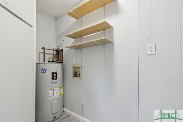 utility room featuring water heater