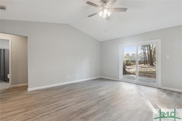 unfurnished room with light wood-type flooring, ceiling fan, and lofted ceiling