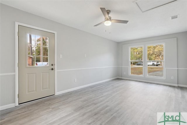 unfurnished room featuring ceiling fan and light wood-type flooring