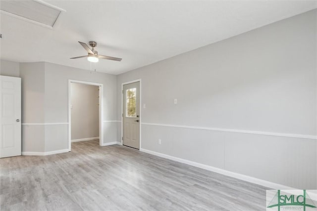 unfurnished room featuring light hardwood / wood-style flooring and ceiling fan