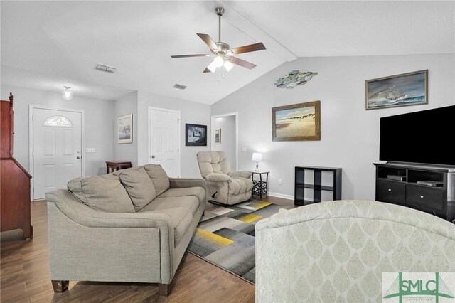 living room featuring dark hardwood / wood-style floors, ceiling fan, and lofted ceiling