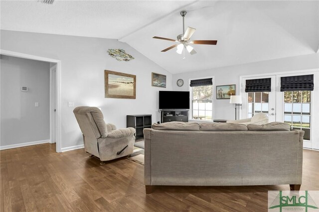 living room with french doors, ceiling fan, dark hardwood / wood-style flooring, and lofted ceiling