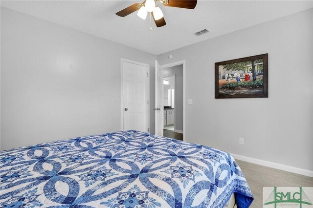 carpeted bedroom featuring ceiling fan