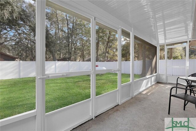 unfurnished sunroom with a healthy amount of sunlight