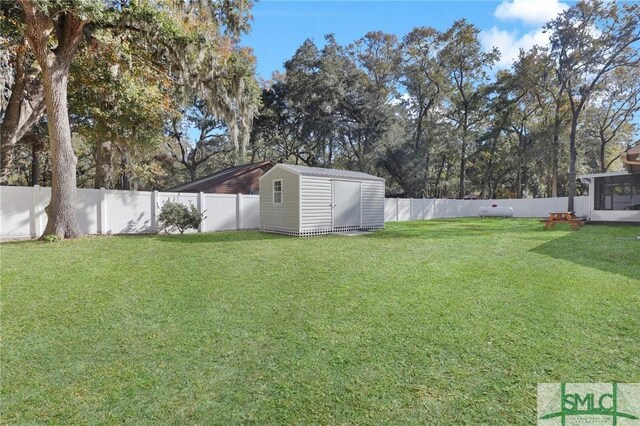 view of yard with a storage unit