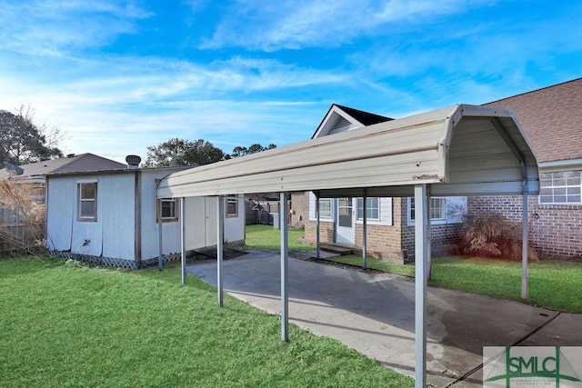 view of parking featuring a yard and a carport