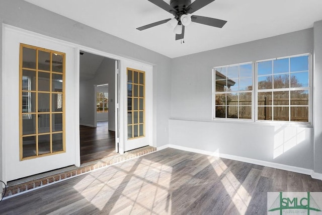 interior space featuring ceiling fan and french doors