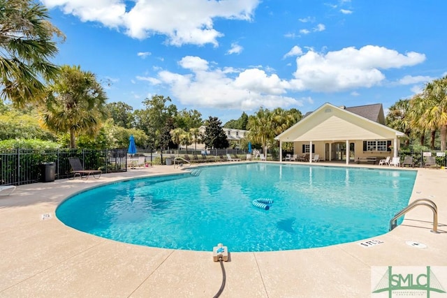 view of swimming pool featuring a patio