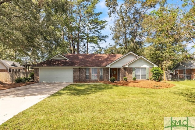 ranch-style home featuring a garage and a front lawn