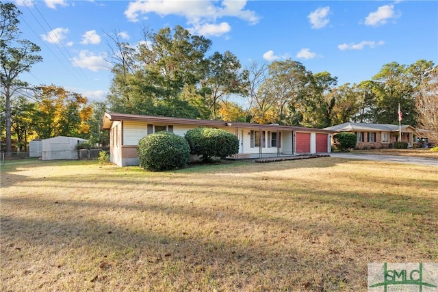 ranch-style home with a front yard