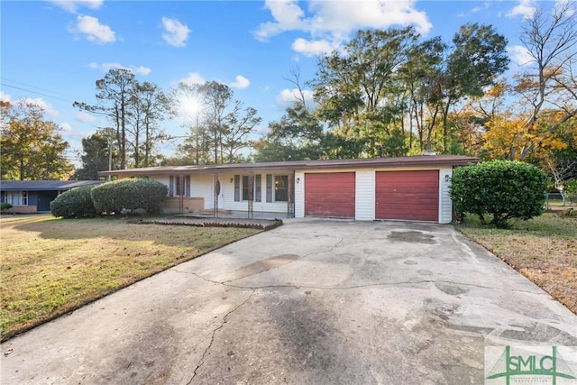 single story home featuring a front yard and a garage