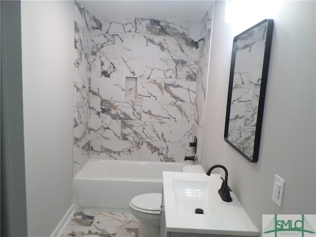 full bathroom featuring vanity, tiled shower / bath combo, and toilet