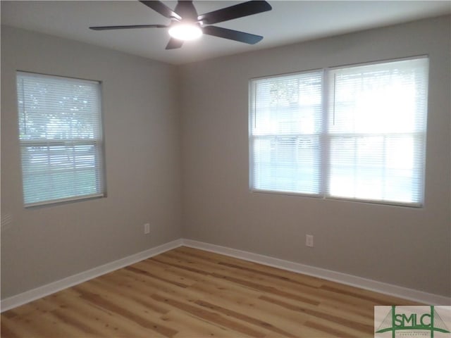 unfurnished room featuring light hardwood / wood-style floors and ceiling fan