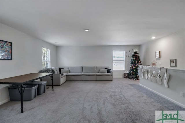 living room featuring light colored carpet