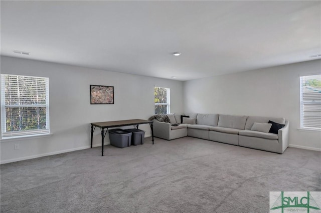 living room featuring light colored carpet