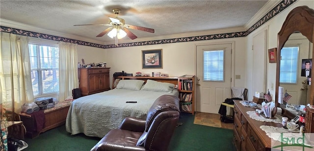 bedroom featuring ceiling fan, a textured ceiling, and dark colored carpet