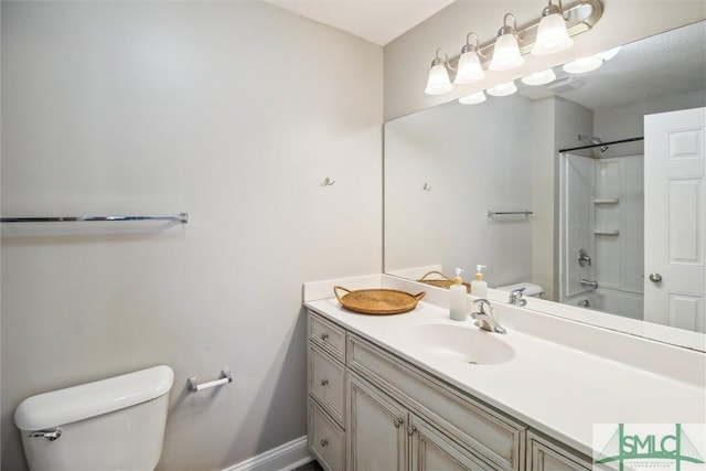 full bathroom with toilet, vanity, and shower / tub combination