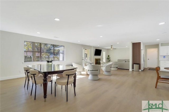 dining room with light hardwood / wood-style floors