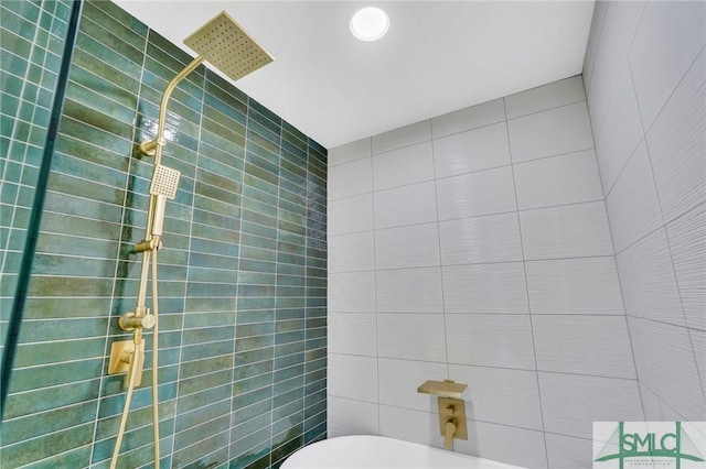 bathroom with a tile shower