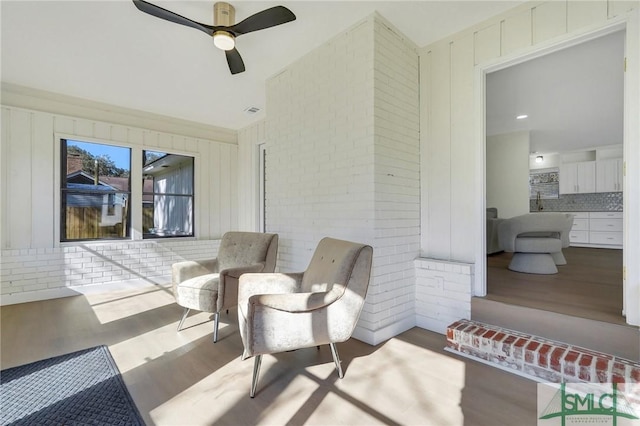 view of patio with ceiling fan