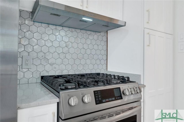 kitchen with backsplash, stainless steel gas stove, and extractor fan