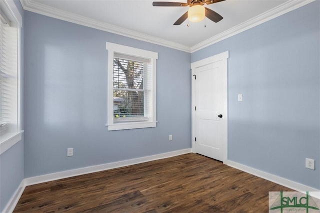 unfurnished room featuring ceiling fan, ornamental molding, and dark wood-type flooring