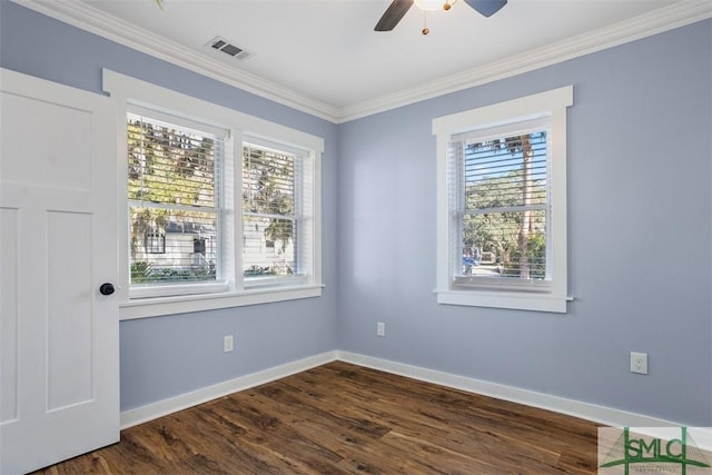 spare room with crown molding, dark hardwood / wood-style flooring, and ceiling fan