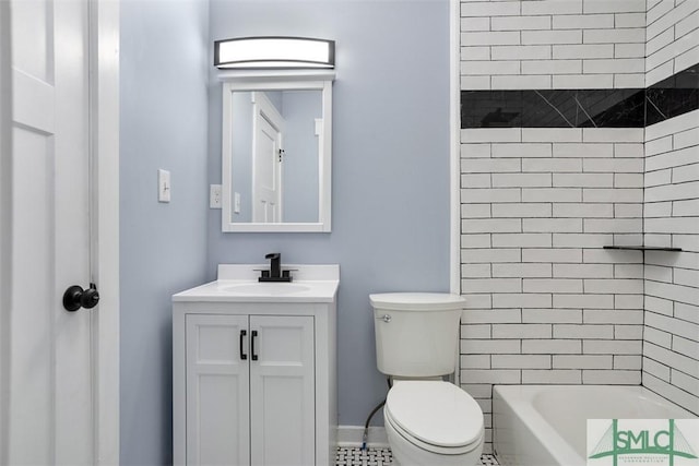 full bathroom with tile patterned floors, vanity, toilet, and tiled shower / bath