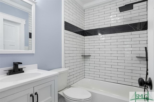 full bathroom with vanity, toilet, tiled shower / bath, and crown molding