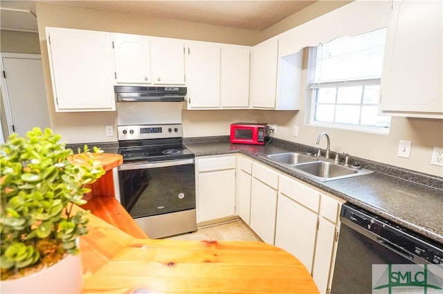 kitchen with white cabinets, stainless steel appliances, and sink